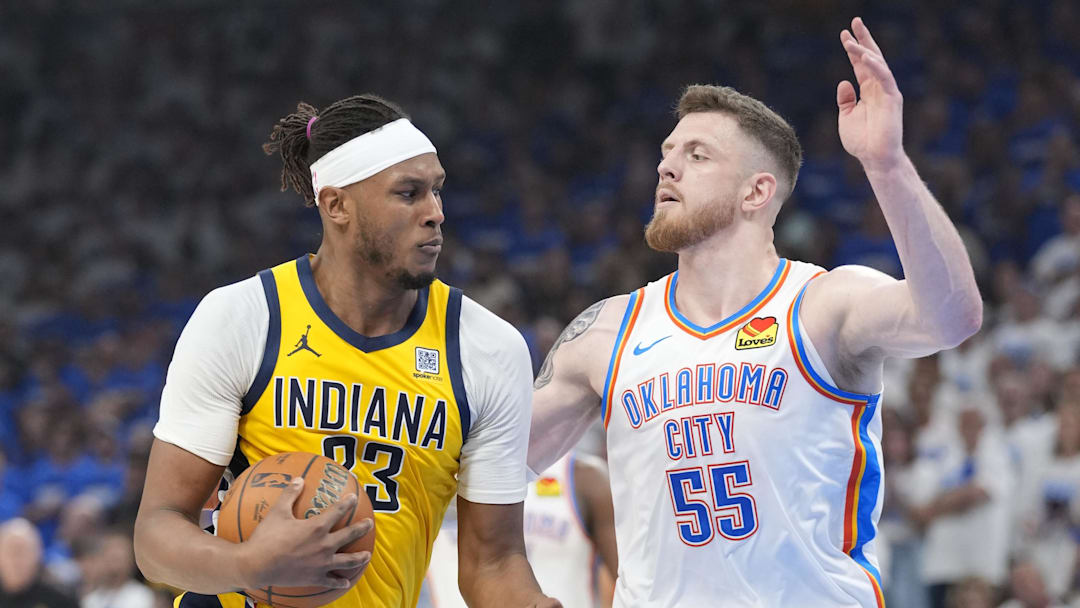 Jun 16, 2025; Oklahoma City, Oklahoma, USA; Indiana Pacers center Myles Turner (33) drives to the basket against Oklahoma City Thunder center Isaiah Hartenstein (55) during the second quarter of game five of the 2025 NBA Finals at Paycom Center. Mandatory Credit: Kyle Terada-Imagn Images