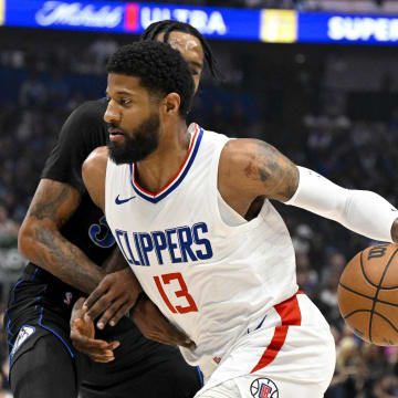 May 3, 2024; Dallas, Texas, USA; LA Clippers forward Paul George (13) drives to the basket against the Dallas Mavericks during the first quarter during game six of the first round for the 2024 NBA playoffs at American Airlines Center. 