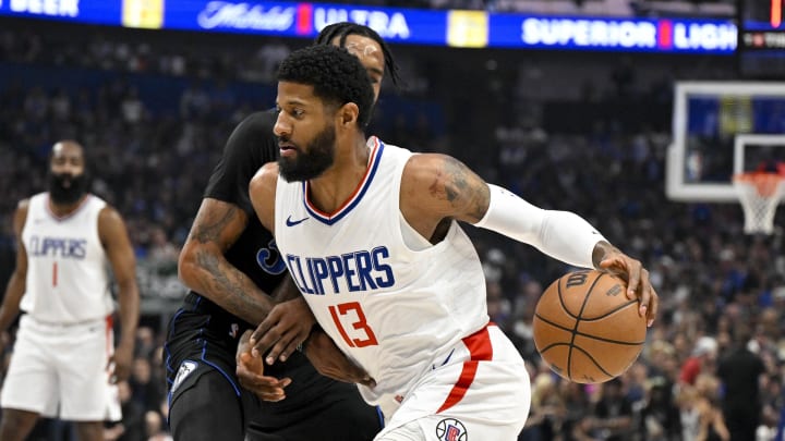 May 3, 2024; Dallas, Texas, USA; LA Clippers forward Paul George (13) drives to the basket against the Dallas Mavericks during the first quarter during game six of the first round for the 2024 NBA playoffs at American Airlines Center. 