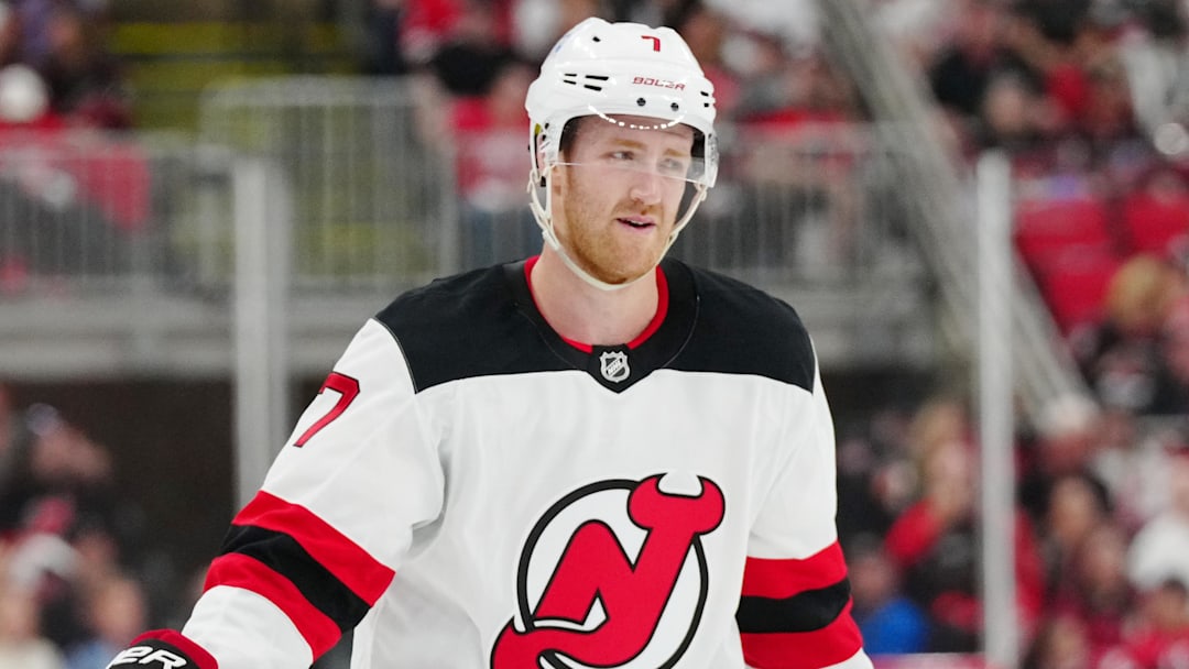 Apr 20, 2025; Raleigh, North Carolina, USA; New Jersey Devils defenseman Dougie Hamilton (7) looks on against the Carolina Hurricanes during the third period of game one of the first round of the 2025 Stanley Cup Playoffs at Lenovo Center. Mandatory Credit: James Guillory-Imagn Images