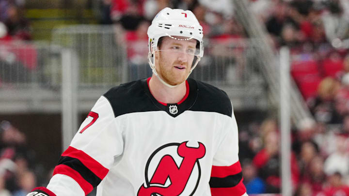 Apr 20, 2025; Raleigh, North Carolina, USA; New Jersey Devils defenseman Dougie Hamilton (7) looks on against the Carolina Hurricanes during the third period of game one of the first round of the 2025 Stanley Cup Playoffs at Lenovo Center. Mandatory Credit: James Guillory-Imagn Images