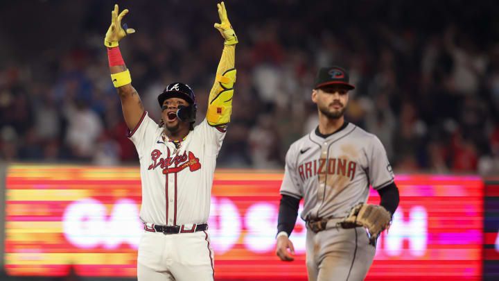 Apr 6, 2024; Atlanta, Georgia, USA; Atlanta Braves right fielder Ronald Acuna Jr. (13) celebrates after hitting a game-tying single in the 8th inning.