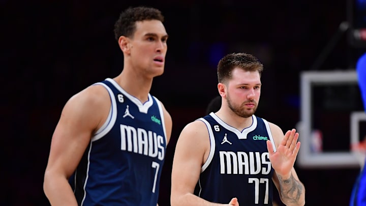 Jan 12, 2023; Los Angeles, California, USA; Dallas Mavericks guard Luka Doncic (77) celebrates with center Dwight Powell (7) his three point basket scored against the Los Angeles Lakers during the second half at Crypto.com Arena. Mandatory Credit: Gary A. Vasquez-Imagn Images Jan 12, 2023; Los Angeles, California, USA; Dallas Mavericks guard Luka Doncic (77) celebrates with center Dwight Powell (7) his three point basket scored against the Los Angeles Lakers during the second half at Crypto.com Arena. Mandatory Credit: Gary A. Vasquez-Imagn Images