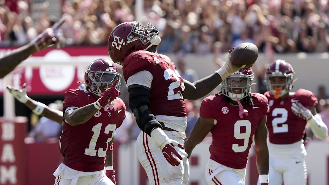 Alabama Crimson Tide defensive lineman LT Overton celebrates after recovering a South Carolina fumble at Bryant-Denny Stadium. Alabama Crimson Tide defensive lineman LT Overton celebrates after recovering a South Carolina fumble at Bryant-Denny Stadium.