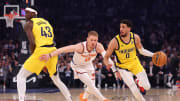 May 19, 2024; New York, New York, USA; Indiana Pacers forward Pascal Siakam (43) sets a pick for guard Tyrese Haliburton (0) against New York Knicks guard Donte DiVincenzo (0) during the first quarter of game seven of the second round of the 2024 NBA playoffs at Madison Square Garden. Mandatory Credit: Brad Penner-USA TODAY Sports