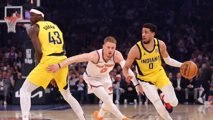 May 19, 2024; New York, New York, USA; Indiana Pacers forward Pascal Siakam (43) sets a pick for guard Tyrese Haliburton (0) against New York Knicks guard Donte DiVincenzo (0) during the first quarter of game seven of the second round of the 2024 NBA playoffs at Madison Square Garden. Mandatory Credit: Brad Penner-USA TODAY Sports