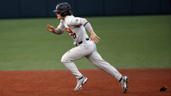 Jun 12, 2022; Corvallis, OR, USA; Oregon State Beavers infielder Travis Bazzana (37) runs toward third base in the 6th inning against the Auburn Tigers during Game 2 of a NCAA Super Regional game at Coleman Field. Mandatory Credit: Soobum Im-USA TODAY Sports