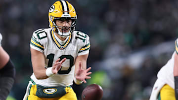 Green Bay Packers quarterback Jordan Love (10) drops back to pass against the Philadelphia Eagles during the third quarter in an NFC wild card game at Lincoln Financial Field.