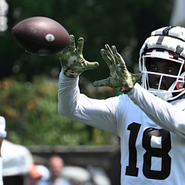 Aug 4, 2024; Cleveland Browns wide receiver David Bell (18) catches the ball during practice at the Browns training facility in Berea, Ohio. Mandatory Credit: Bob Donnan-Imagn Images