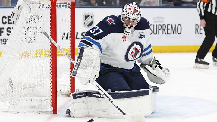 Apr 4, 2026; Columbus, Ohio, USA; Winnipeg Jets goalie Connor Hellebuyck (37) makes a save against the Columbus Blue Jackets during the second period at Nationwide Arena. Mandatory Credit: Russell LaBounty-Imagn Images