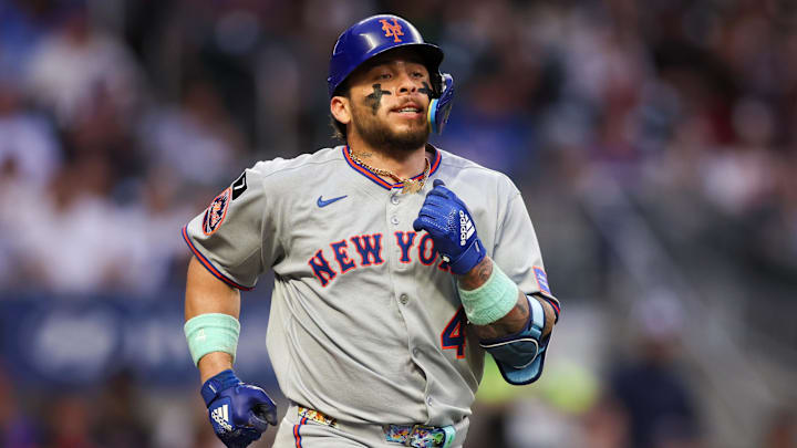 New York Mets catcher Francisco Alvarez (4) walks against the Atlanta Braves in the second inning at Truist Park. New York Mets catcher Francisco Alvarez (4) walks against the Atlanta Braves in the second inning at Truist Park.