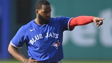 Jun 25, 2025; Cleveland, Ohio, USA; Toronto Blue Jays first baseman Vladimir Guerrero Jr. (27) stands on the field in the first inning against the Cleveland Guardians at Progressive Field.