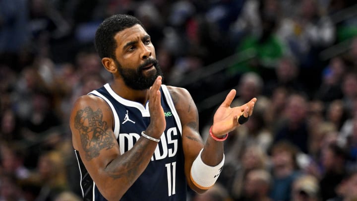 Jan 3, 2024; Dallas, Texas, USA; Dallas Mavericks guard Kyrie Irving (11) celebrates after making a basket against the Portland Trail Blazers during the second quarter at the American Airlines Center. Mandatory Credit: Jerome Miron-USA TODAY Sports