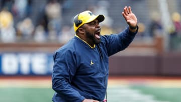 Michigan defensive run game coordinator and linebackers coach Brian Jean-Mary talks to Maize Team players during the second half of the spring game at Michigan Stadium in Ann Arbor on Saturday, April 20, 2024.