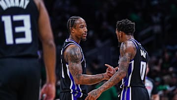 Jan 10, 2025; Boston, Massachusetts, USA; Sacramento Kings forward DeMar DeRozan (10) and guard Malik Monk (0) react after defeating the Boston Celtics in the second half at TD Garden. Mandatory Credit: David Butler II-Imagn Images