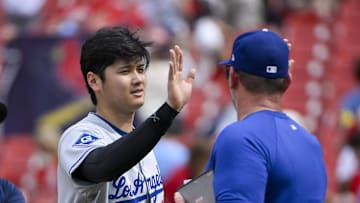 Jun 8, 2025; St. Louis, Missouri, USA;  Los Angeles Dodgers designated hitter Shohei Ohtani (17) celebrates with teammates after the Dodgers defeated the St. Louis Cardinals at Busch Stadium. Mandatory Credit: Jeff Curry-Imagn Images