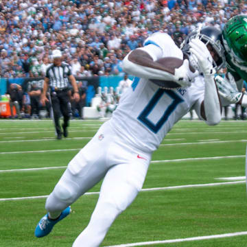 Tennessee Titans wide receiver Calvin Ridley (0) heads for the end zone pylon as New York Jets cornerback Sauce Gardner (1) tries to make the tackle during their game at Nissan Stadium in Nashville, Tenn., Sunday, Sept. 15, 2024.