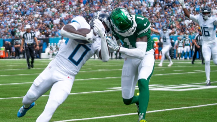 Tennessee Titans wide receiver Calvin Ridley (0) heads for the end zone pylon as New York Jets cornerback Sauce Gardner (1) tries to make the tackle during their game at Nissan Stadium in Nashville, Tenn., Sunday, Sept. 15, 2024.