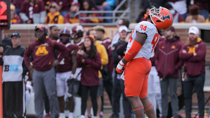 Nov 6, 2021; Minneapolis, Minnesota, USA; Illinois Fighting Illini defensive lineman Jer'Zhan Newton (94) reacts to a missed stop in the third quarter at Huntington Bank Stadium. Mandatory Credit: Matt Krohn-USA TODAY Sports