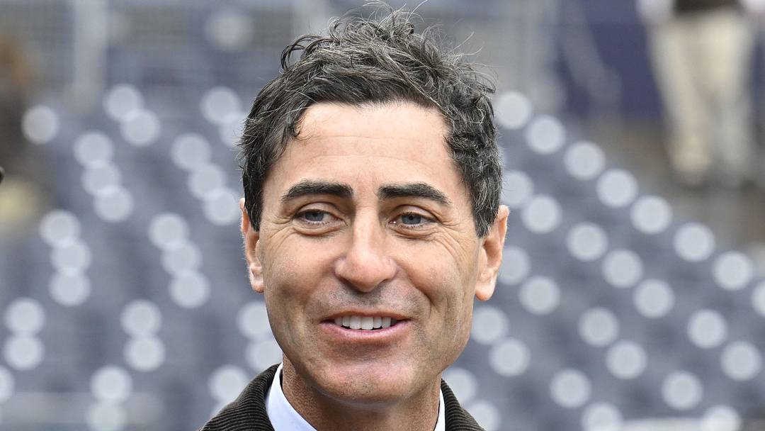 Mar 27, 2025; San Diego, California, USA; San Diego Padres general manager A.J. Preller looks on before an Opening Day baseball game between the San Diego Padres and the Atlanta Braves at Petco Park. Mandatory Credit: Denis Poroy-Imagn Images

