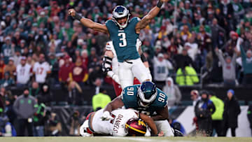 Jan 26, 2025; Philadelphia, PA, USA; Philadelphia Eagles linebacker Nolan Smith Jr. (3) celebrates as defensive tackle Jordan Davis (90) sacks Washington Commanders quarterback Jayden Daniels (5) during the second half in the NFC Championship game at Lincoln Financial Field. Mandatory Credit: Bill Streicher-Imagn Images