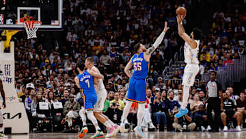 May 15, 2025; Denver, Colorado, USA; Denver Nuggets guard Jamal Murray (27) shoots a jumper against Oklahoma City Thunder center Isaiah Hartenstein (55) in the first quarter during Game 6 of the second round at Ball Arena. Mandatory Credit: Isaiah J. Downing-Imagn Images