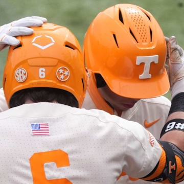 Tennessee's Dalton Bargo (16) and Gavin Kilen (6) celebrating Bargo's home run during an NCAA college baseball game against St. Bonaventure on Sunday, March 9, 2025, in Knoxville, Tenn.