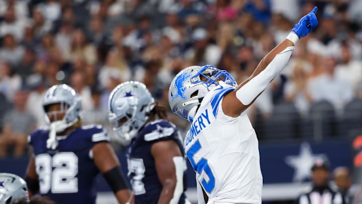 Detroit Lions running back David Montgomery reacts after scoring a touchdown during the second quarter against the Dallas Cowboys.