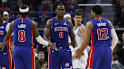 Oct 29, 2025; Detroit, Michigan, USA; Detroit Pistons center Jalen Duren (0) receives congratulations from guard Caris LeVert (8) and forward Tobias Harris (12) in the first half against the Orlando Magic at Little Caesars Arena. Mandatory Credit: Rick Osentoski-Imagn Images