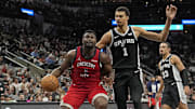 Feb 2, 2024; San Antonio, Texas, USA; New Orleans Pelicans forward Zion Williamson (1) drives to the basket while defended by San Antonio Spurs forward Victor Wembanyama (1) during the first half at Frost Bank Center. Mandatory Credit: Scott Wachter-Imagn Images
