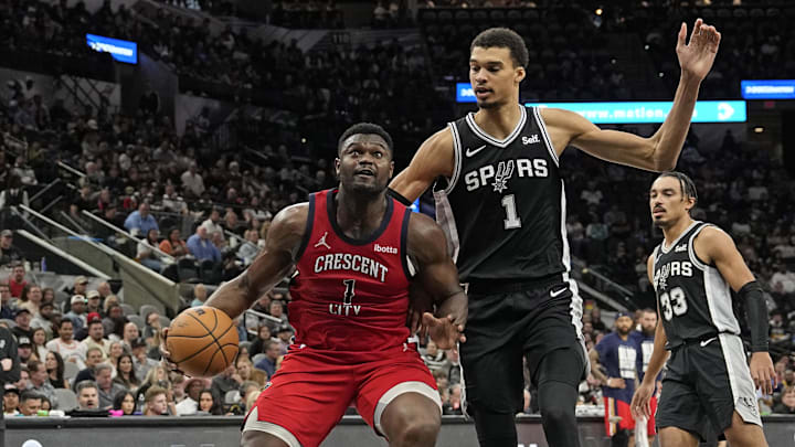 Feb 2, 2024; San Antonio, Texas, USA; New Orleans Pelicans forward Zion Williamson (1) drives to the basket while defended by San Antonio Spurs forward Victor Wembanyama (1) during the first half at Frost Bank Center. Mandatory Credit: Scott Wachter-Imagn Images Feb 2, 2024; San Antonio, Texas, USA; New Orleans Pelicans forward Zion Williamson (1) drives to the basket while defended by San Antonio Spurs forward Victor Wembanyama (1) during the first half at Frost Bank Center. Mandatory Credit: Scott Wachter-Imagn Images