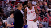 Nov 12, 2025; Houston, Texas, USA; Houston Rockets forward Kevin Durant (7) talks with Houston Rockets head coach Ime Udoka on the sideline against the Washington Wizards during the fourth quarter at Toyota Center. Mandatory Credit: Erik Williams-Imagn Images