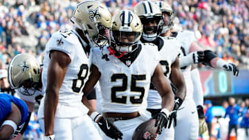 New Orleans Saints running back Kendre Miller (25) and his teammates celebrate the only touchdown of the first quarter, Sunday, December 8, 2024.