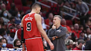 Nov 24, 2021; Houston, Texas, USA; Chicago Bulls head coach Billy Donovan talks with center Nikola Vucevic (9) during the third quarter against the Houston Rockets at Toyota Center. Mandatory Credit: Troy Taormina-Imagn Images