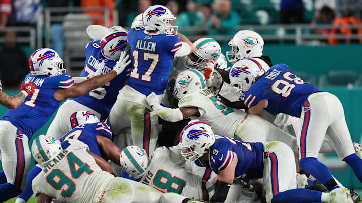 Buffalo Bills quarterback Josh Allen (17) gets stopped on fourth down by the Miami Dolphins defense during the fourth quarter at Hard Rock Stadium in the 2023 regular season finale.