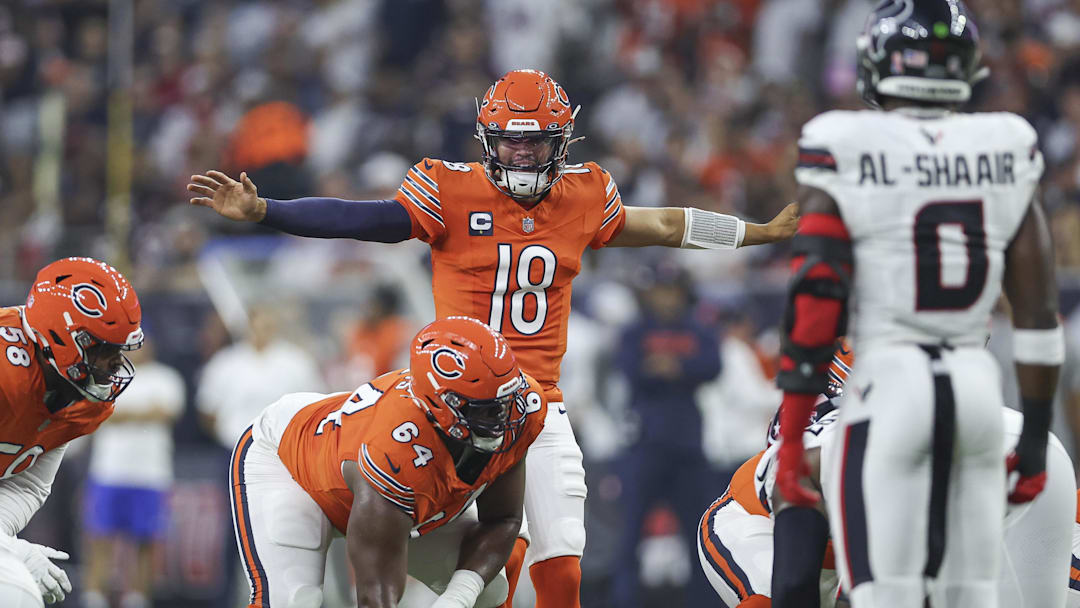 Sep 15, 2024; Houston, Texas, USA; Chicago Bears quarterback Caleb Williams (18) at the line of scrimmage during the first quarter against the Houston Texans at NRG Stadium. Mandatory Credit: Troy Taormina-Imagn Images