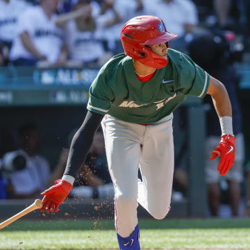 Jul 8, 2023; Seattle, Washington, USA; National League Futures designated hitter Justin Crawford (13) of the Philadelphia Phillies hits an RBI-sacrifice fly against the American League Futures during the second inning of the All Star-Futures Game at T-Mobile Park.