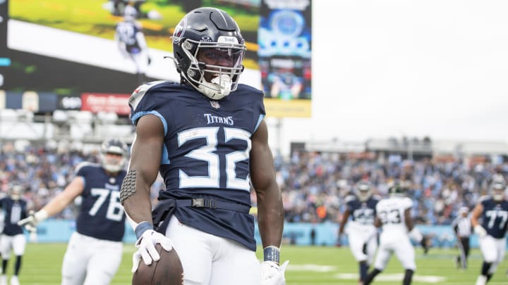 Jan 7, 2024; Nashville, Tennessee, USA;  Tennessee Titans running back Tyjae Spears (32) celebrates his touchdown against the Jacksonville Jaguars during the first half at Nissan Stadium. Mandatory Credit: Steve Roberts-USA TODAY Sports