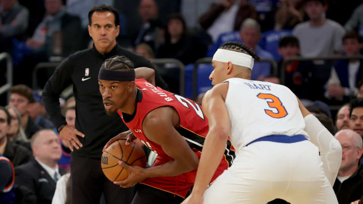 Apr 30, 2023; New York, New York, USA; Miami Heat head coach Erik Spoelstra watches as Heat forward Jimmy Butler (22) controls the ball against New York Knicks guard Josh Hart (3) during the first quarter of game one of the 2023 NBA Eastern Conference semifinal playoffs at Madison Square Garden. Mandatory Credit: Brad Penner-USA TODAY Sports