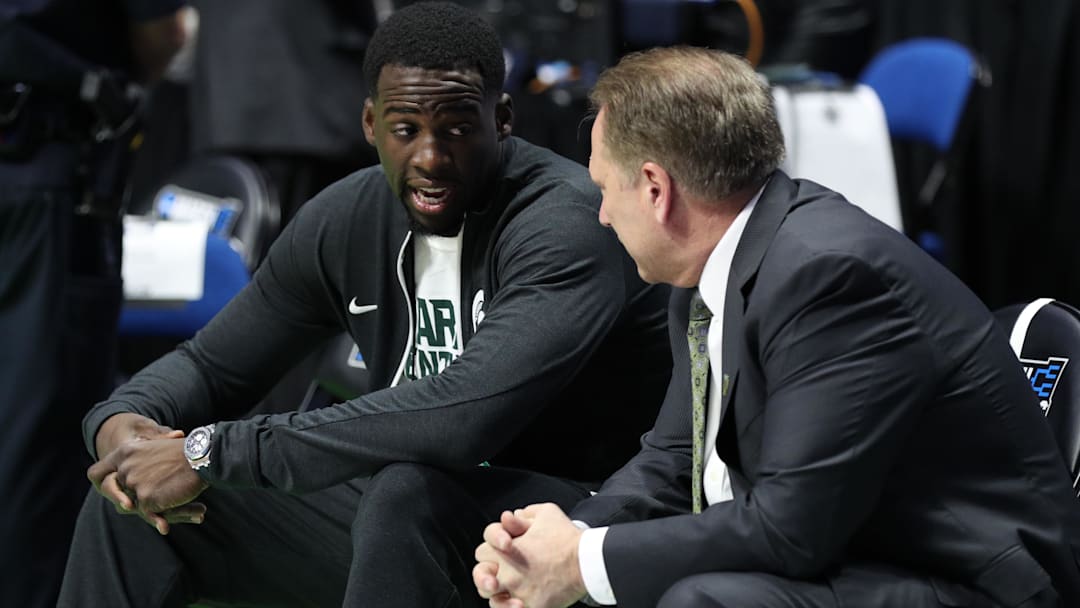 Mar 19, 2017; Tulsa, OK, USA; Golden State Warriors power forward Draymond Green speaks to Michigan State Spartans head coach Tom Izzo before the game between the Kansas Jayhawks and the Michigan State Spartans in the second round of the 2017 NCAA Tournament at BOK Center. Mandatory Credit: Brett Rojo-Imagn Images