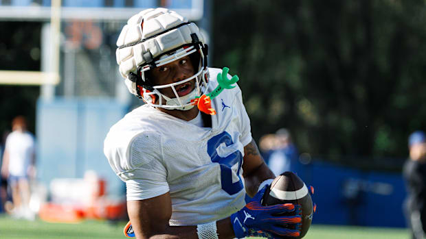 Florida Gators wide receiver Dallas Wilson (6) catches a pass during spring football practice at Heavener Football Complex at