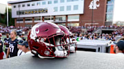 Sep 20, 2025; Pullman, Washington, USA; Washington State Cougars helmet sits during a game against the Washington Huskies in the first half of Apple Cup at Gesa Field at Martin Stadium. Mandatory Credit: James Snook-Imagn Images