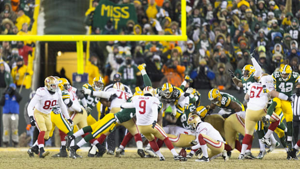 San Francisco 49ers kicker Phil Dawson (9) kicks the game-winning field goal to eliminate the Green Bay Packers.