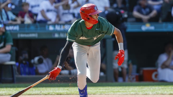 Jul 8, 2023; Seattle, Washington, USA; National League Futures designated hitter Justin Crawford (13) of the Philadelphia Phillies hits an RBI-sacrifice fly against the American League Futures during the second inning of the All Star-Futures Game at T-Mobile Park.