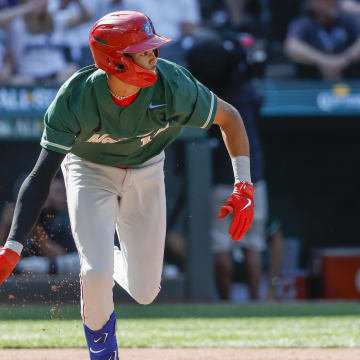 Jul 8, 2023; Seattle, Washington, USA; National League Futures designated hitter Justin Crawford (13) of the Philadelphia Phillies hits an RBI-sacrifice fly against the American League Futures during the second inning of the All Star-Futures Game at T-Mobile Park.