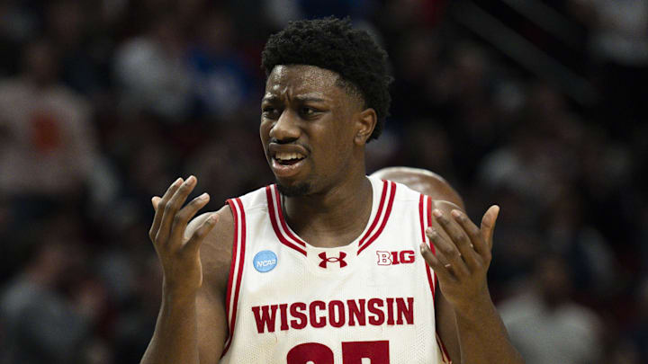 Mar 19, 2026; Portland, OR, USA; Wisconsin Badgers guard Braeden Carrington (0) and guard John Blackwell (25) react during the second half of a first round game of the men's 2026 NCAA Tournament against the High Point Panthers at Moda Center. Mandatory Credit: Troy Wayrynen-Imagn Images
