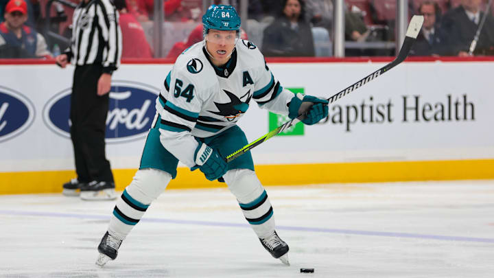 Dec 7, 2024; Sunrise, Florida, USA; San Jose Sharks center Mikael Granlund (64) fakes a shot against the Florida Panthers during the third period at Amerant Bank Arena. Mandatory Credit: Sam Navarro-Imagn Images