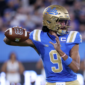 Sep 12, 2025; Pasadena, California, USA;  UCLA Bruins quarterback Nico Iamaleava (9) looks to pass during the first quarter against the New Mexico Lobos at Rose Bowl. Mandatory Credit: Kiyoshi Mio-Imagn Images