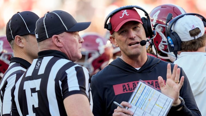 Nov 16, 2024; Tuscaloosa, AL, USA; Alabama Crimson Tide head coach Kalen DeBoer talks with officials during a review at Bryant-Denny Stadium. Alabama defeated Mercer 52-7. Mandatory Credit: Gary Cosby Jr.-Tuscaloosa News