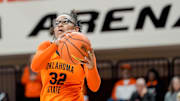 Oklahoma State guard Stailee Heard (32) catches a pass from across the court and lays up the ball in the fourth quarter during an NCAA women’s basketball game between Oklahoma State and McNeese at Gallagher-Iba Arena in Stillwater, Okla., on Monday, Dec. 16, 2024.